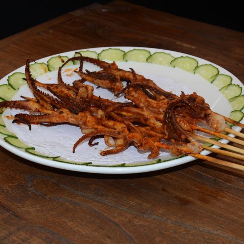 嘻魷記火山石烤魷魚(yú)店產(chǎn)品-魷魚(yú)釘耙